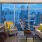 a living room with a view of the city