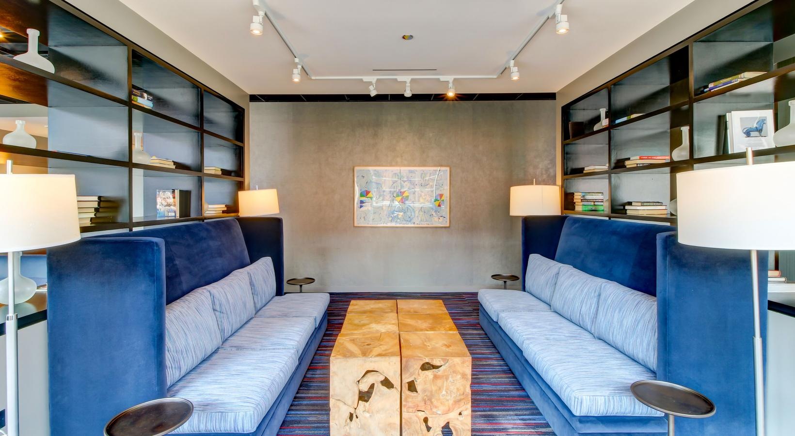 The essence of exceptional living a room with blue couches and a rug