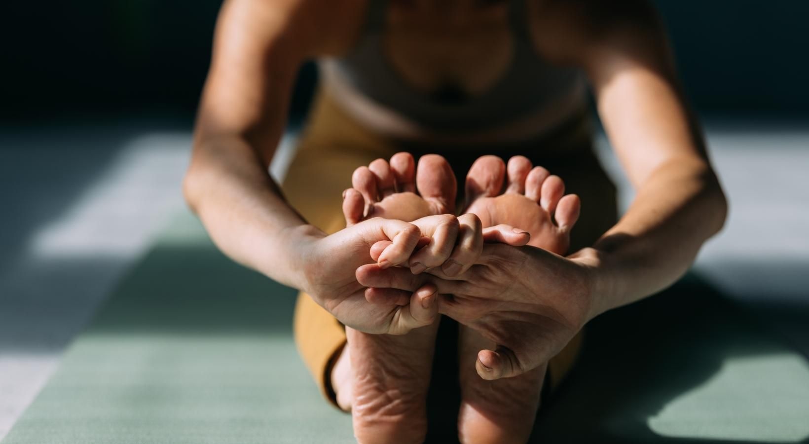 Settle into comfort at Eight O Five a person holding the hands together