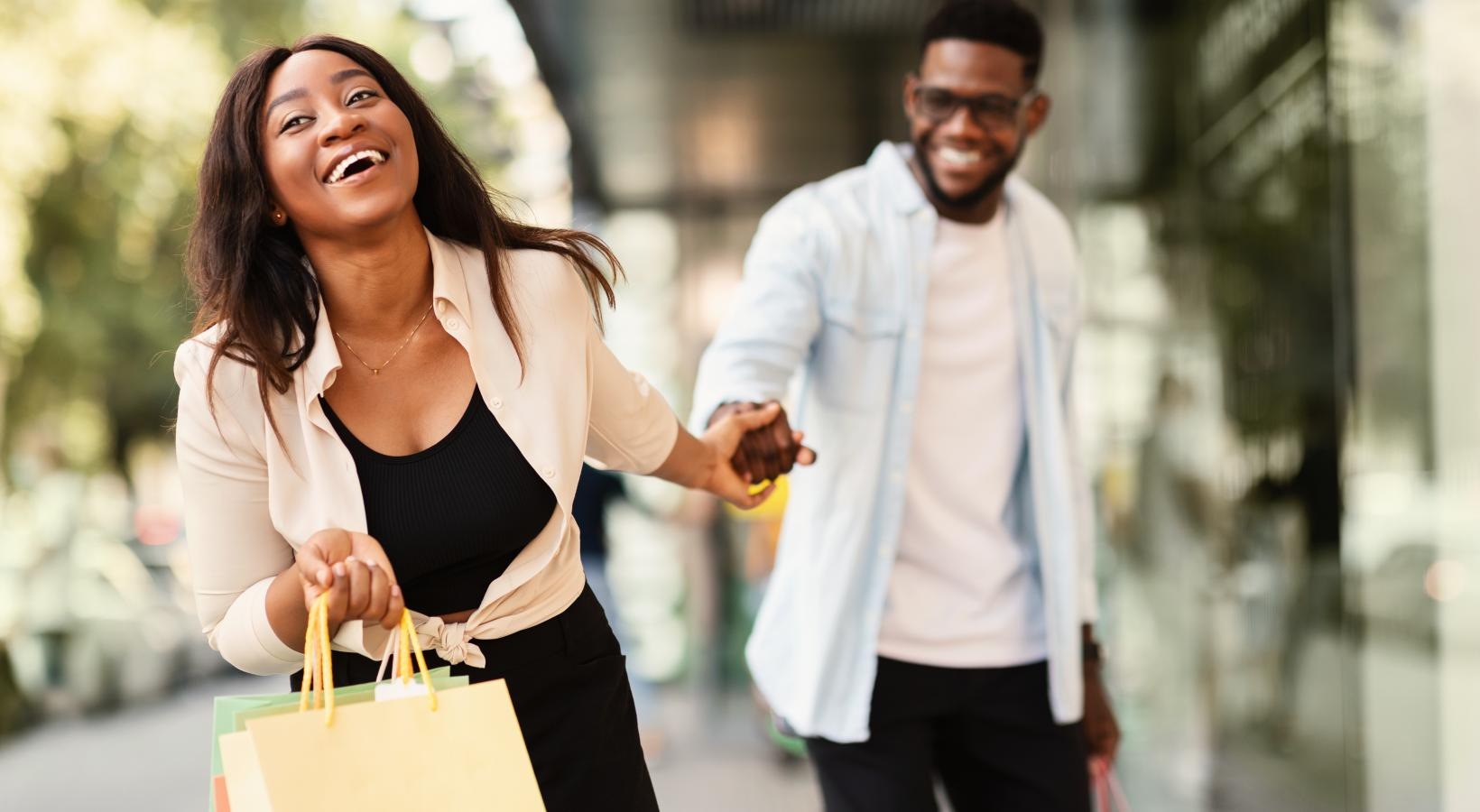 Find your perfect fit at Eight O Five a woman carrying a shopping bag